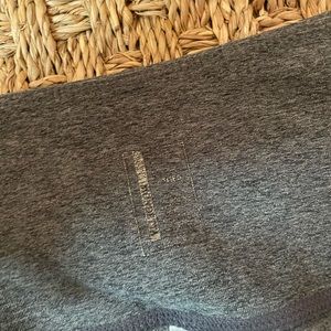 grey leggings with mesh on bottom and pockets